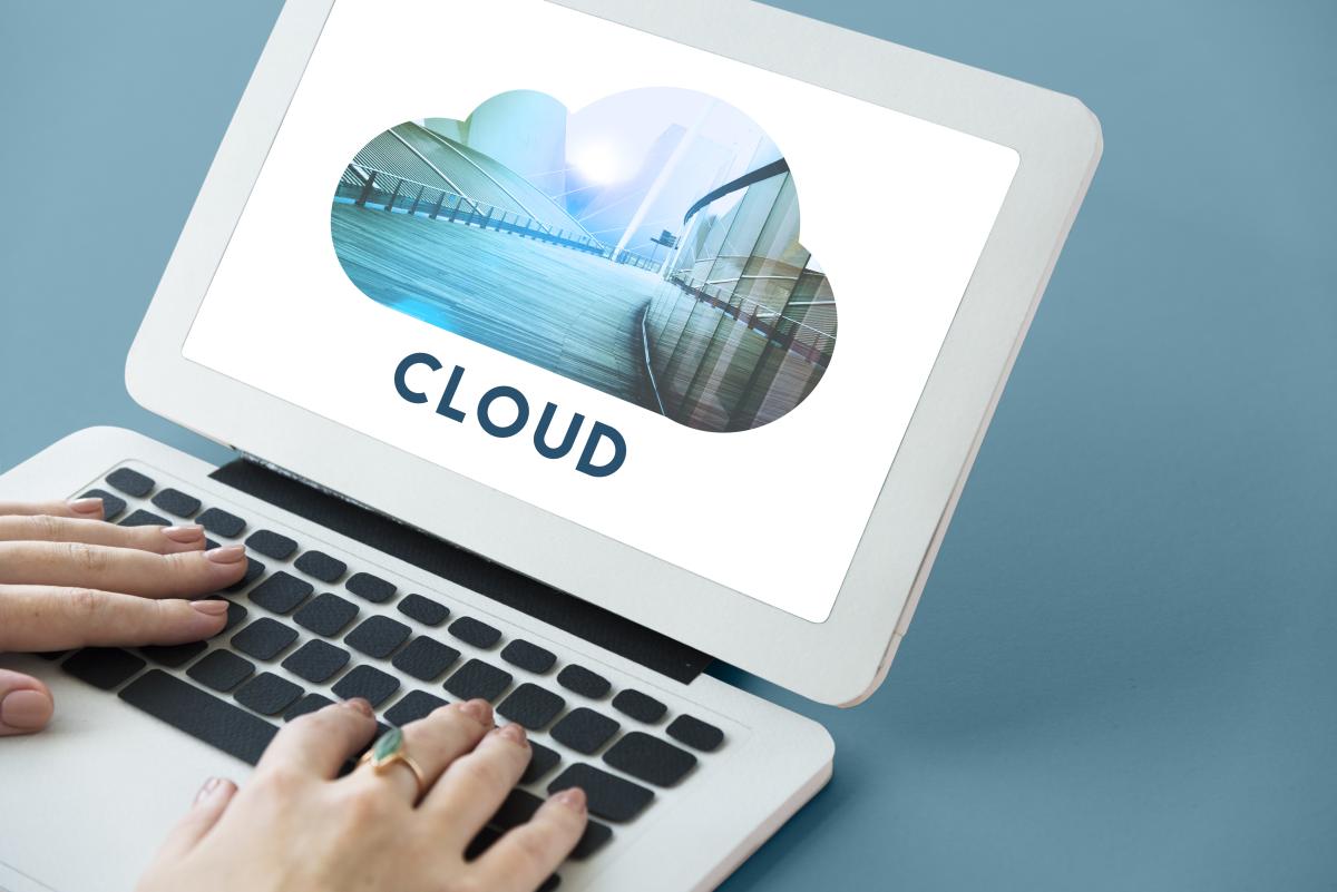 Computer with cloud logo