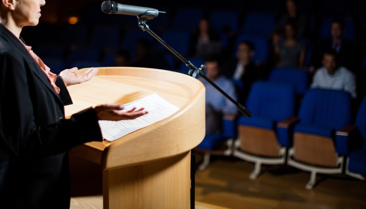 Speaker at podium